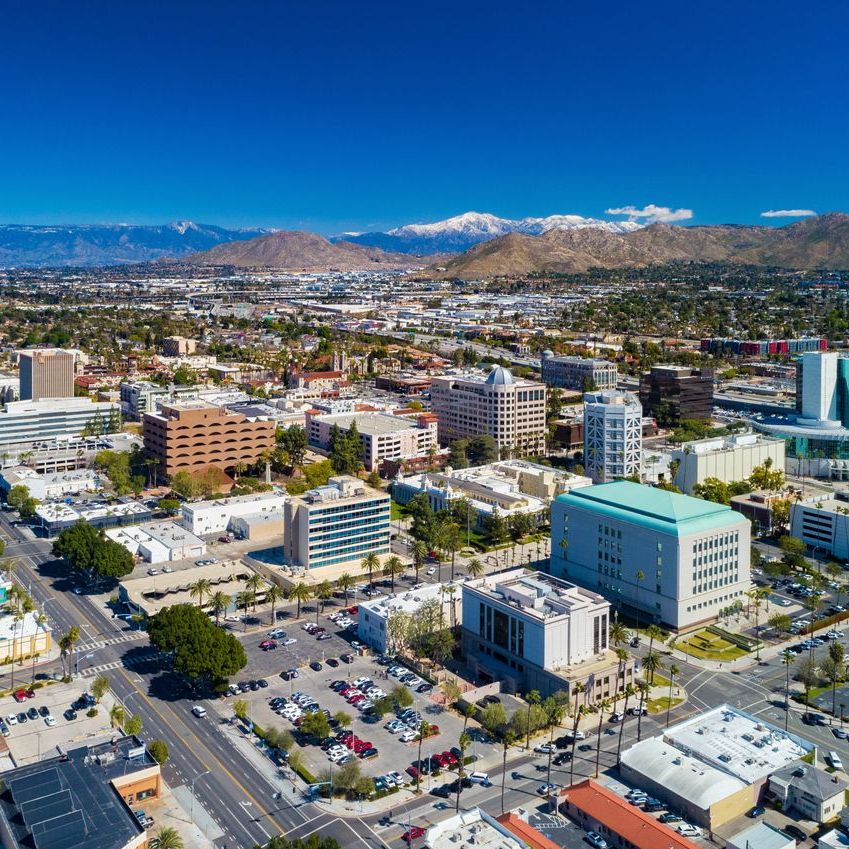 Riverside, California Skyline Aerial With Snowcapped Mountains